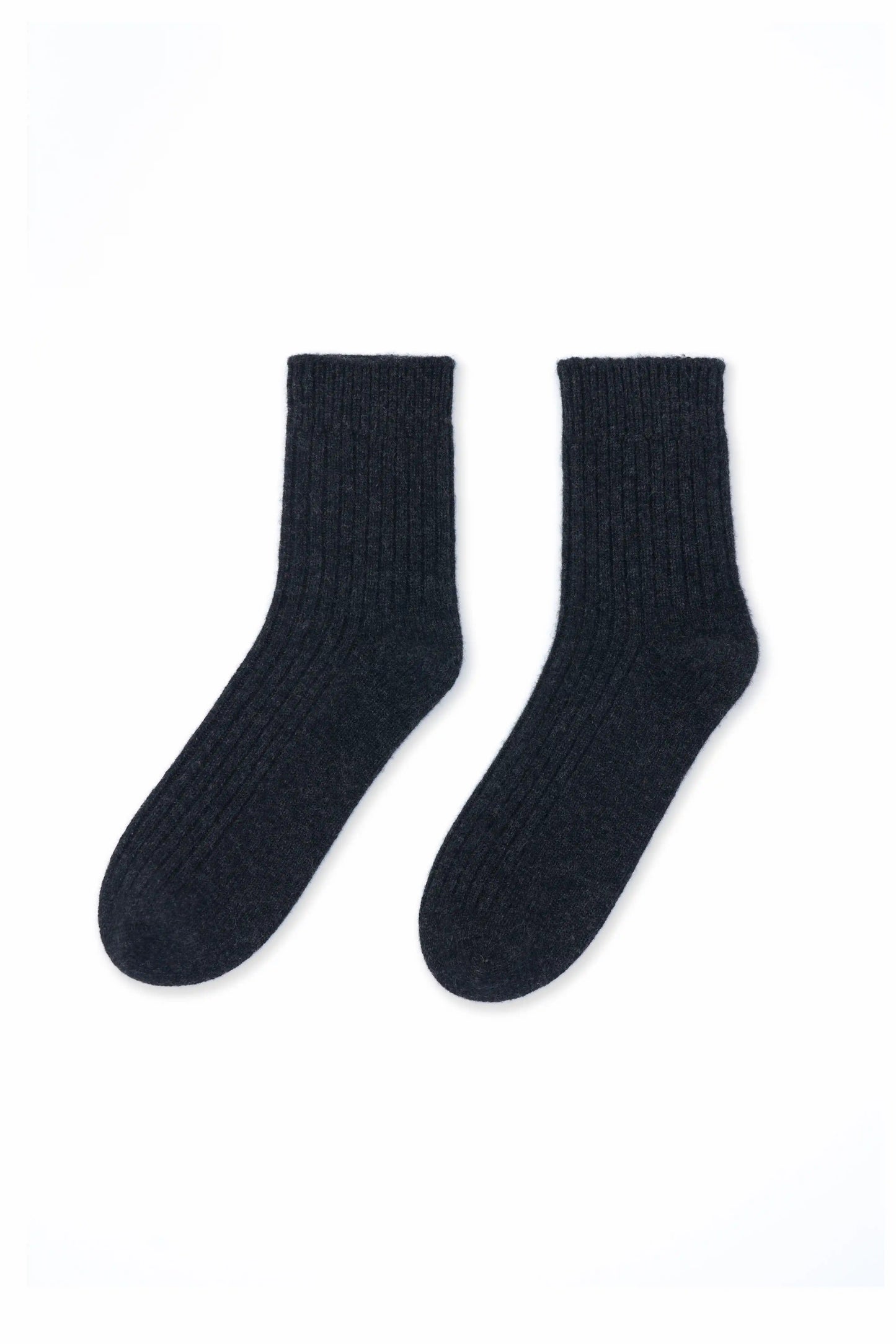 Cozy and soft charcoal Mongolian cashmere socks laid flat on a white background, showcasing their luxurious texture and warmth
