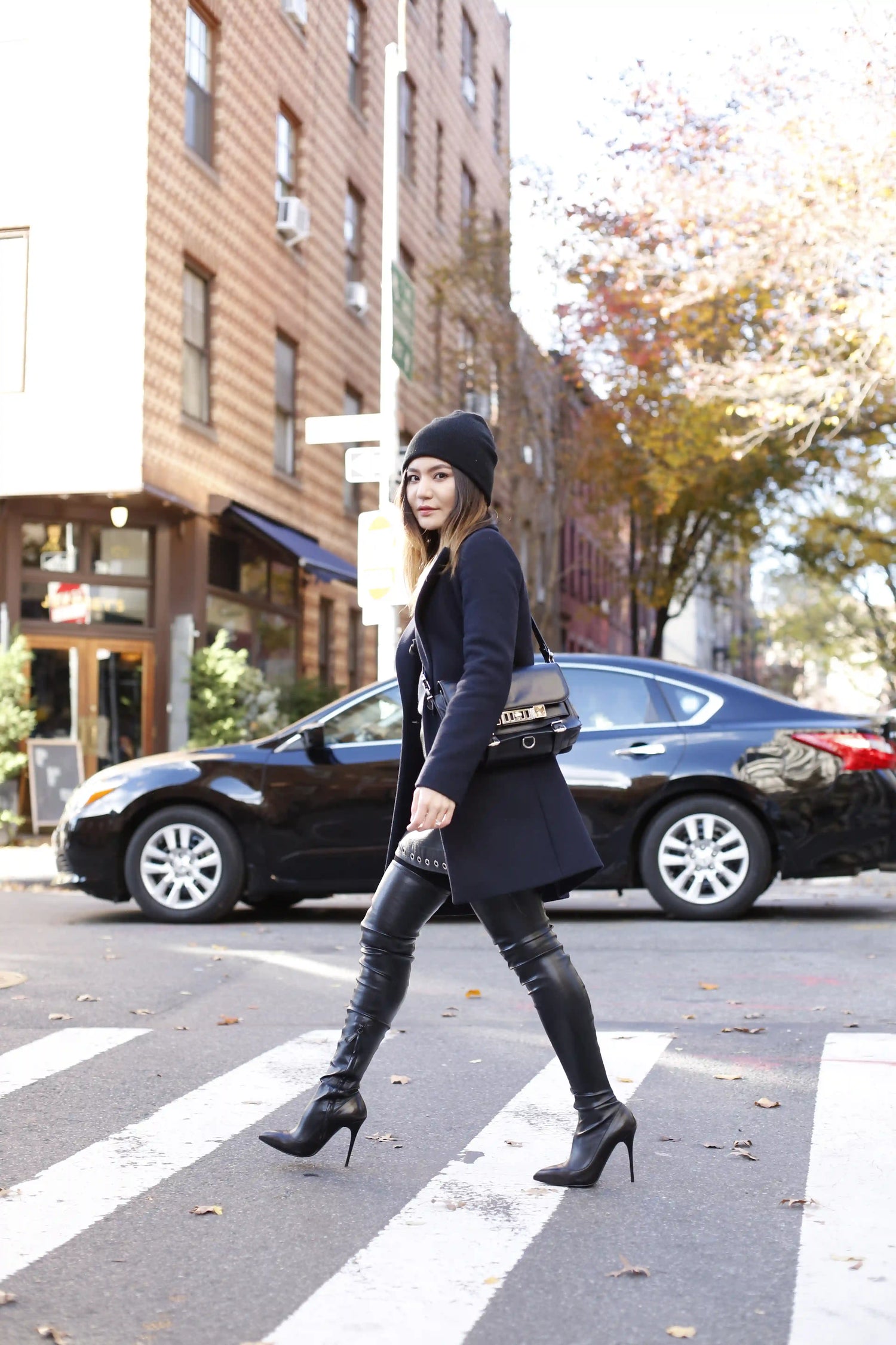Baatar Cashmere owner wearing a slouchy cashmere beanie on a bustling New York street, showcasing timeless winter fashion with premium comfort and style