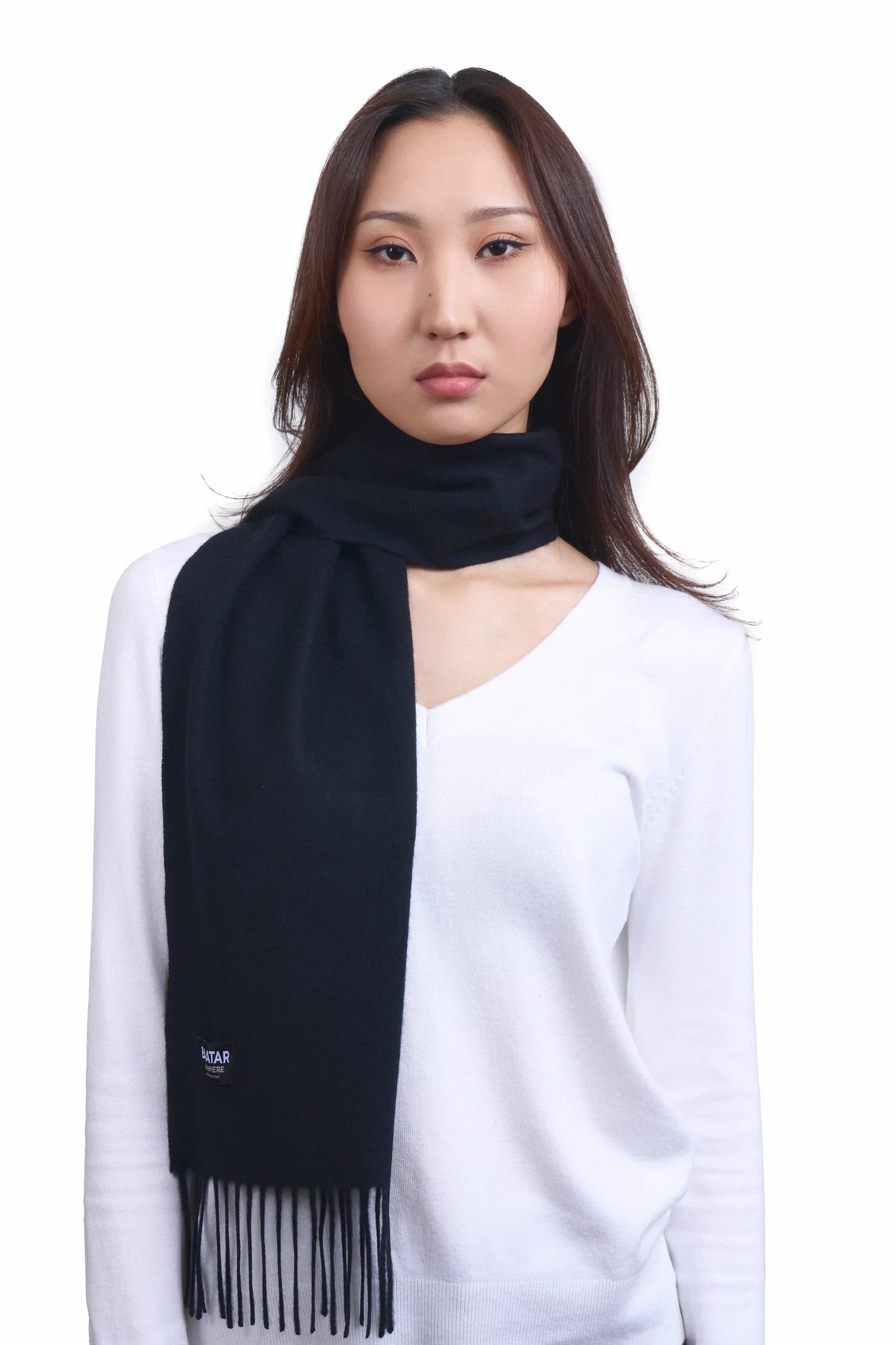 Luxurious black Mongolian cashmere scarf worn on a female Mongolian model, lightweight and cozy, perfect for winter layering