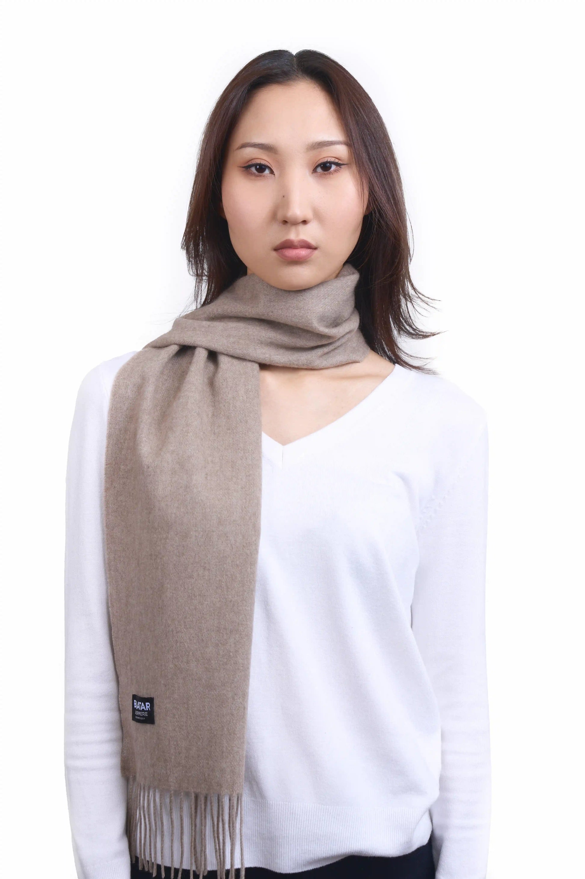 Luxurious natural beige blue Mongolian cashmere scarf worn on a female Mongolian model, lightweight and cozy, perfect for winter layering